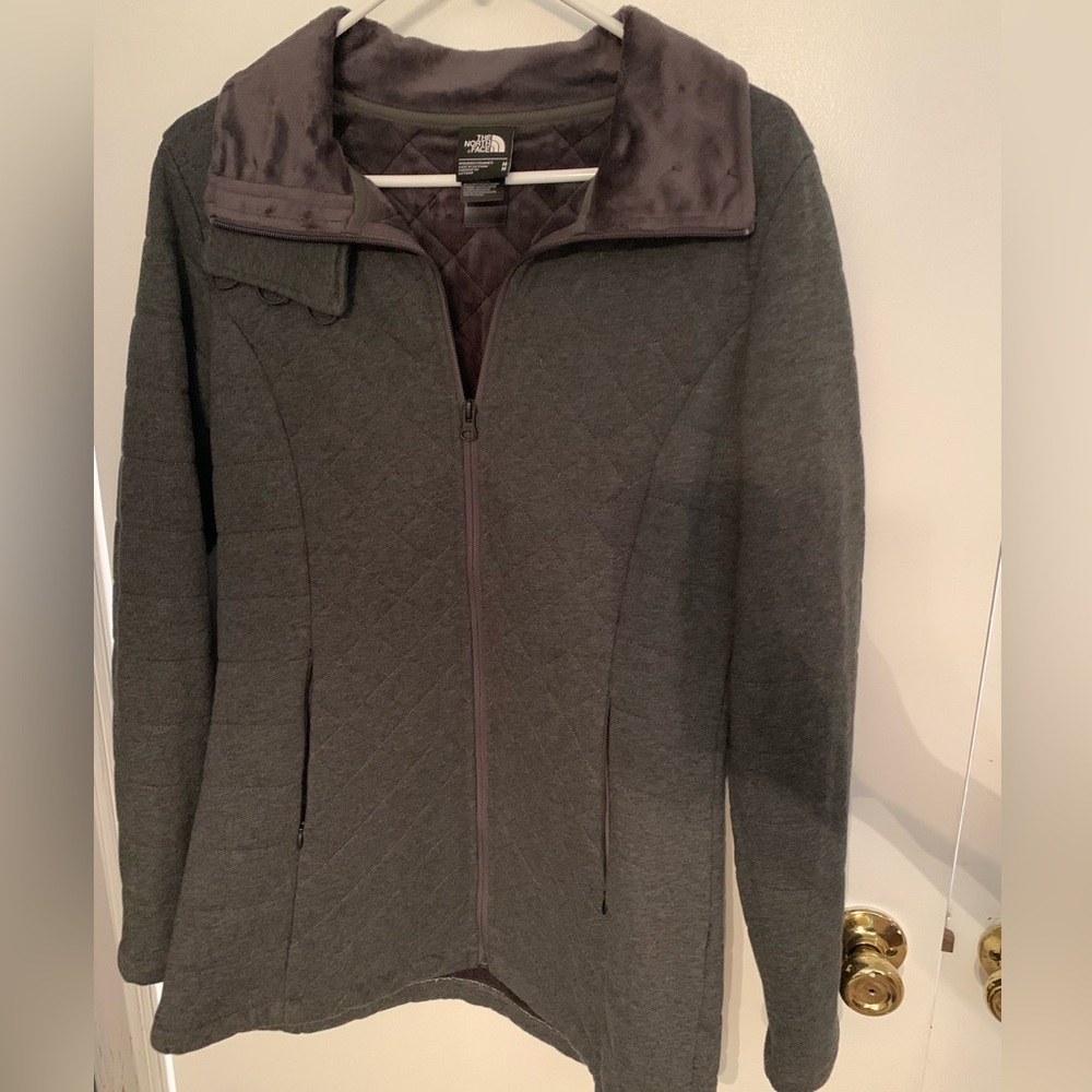 The North face lightweight jacket. Beautiful soft zipper up